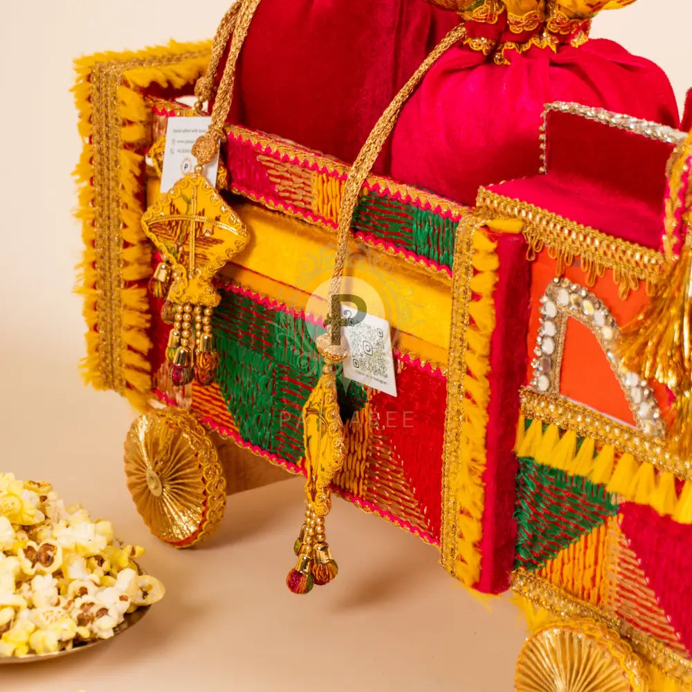 Lohri festive setup featuring colorful truck and potlis