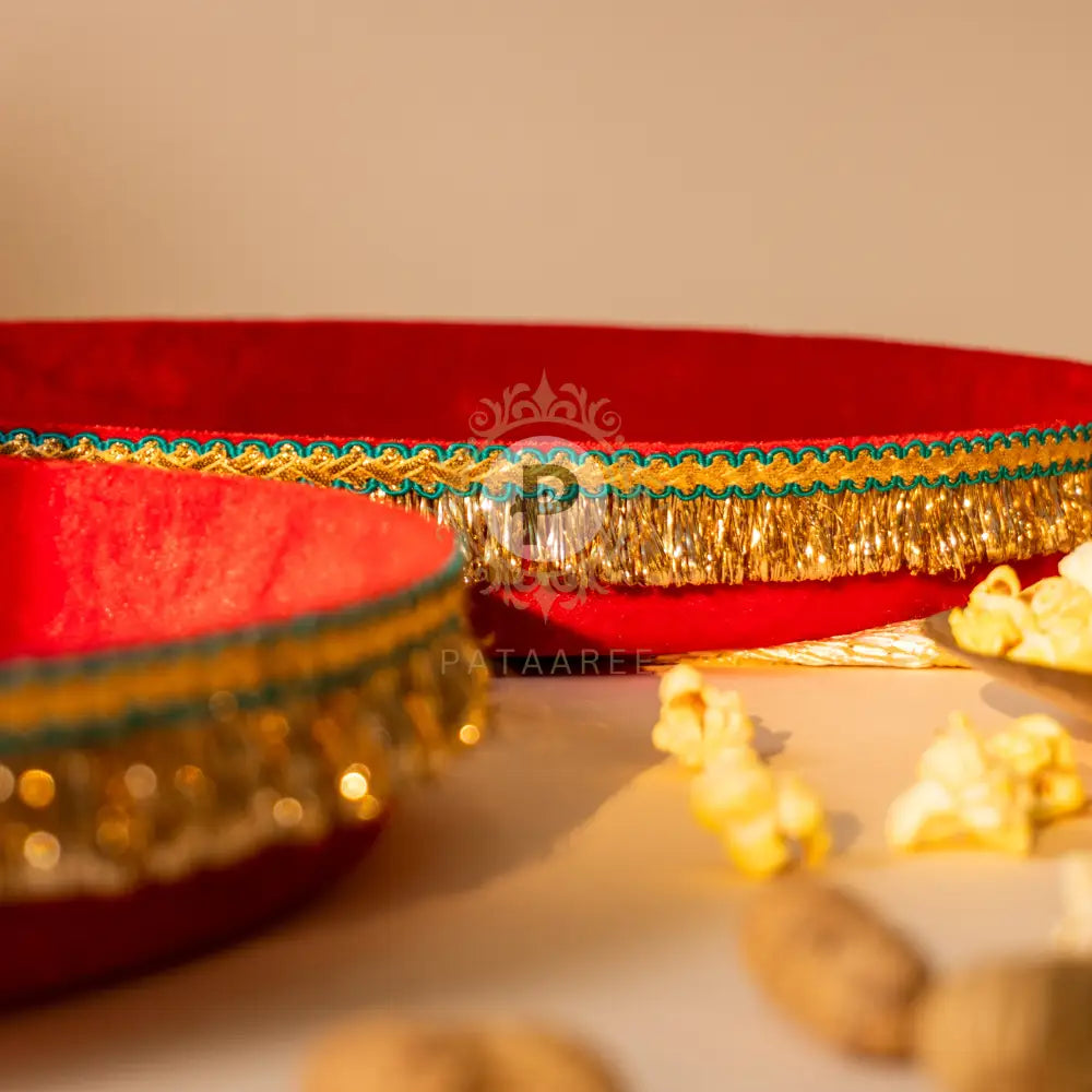 Elegant red velvet thaal for Lohri celebration