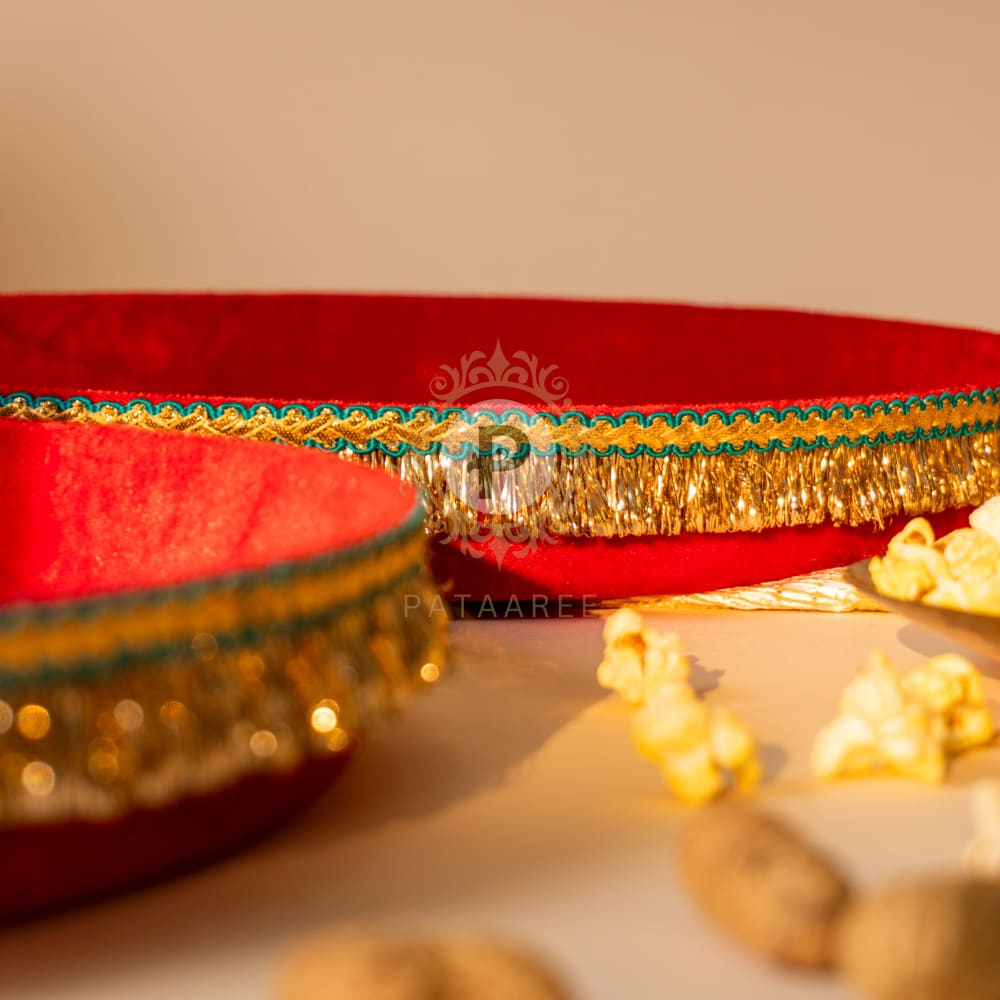 Elegant red velvet thaal for Lohri celebration
