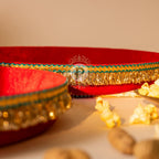 Elegant red velvet thaal for Lohri celebration